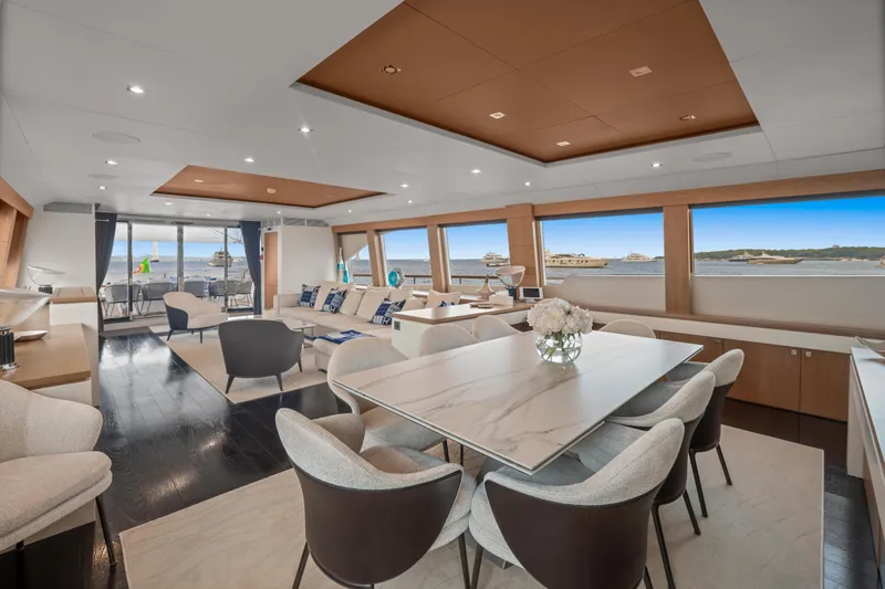 Millesime Yacht Photos Pics Luxurious interior of 2020 Guy Couach 3700 Fly yacht with elegant dining and seating area.