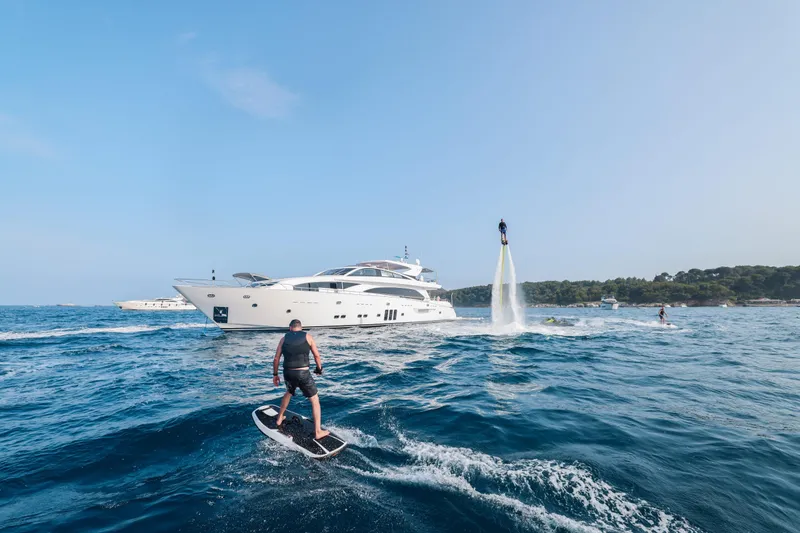 Millesime Yacht Photos Pics Luxury yacht Guy Couach 3700 Fly with water sports activities, 2020 model, in open sea.