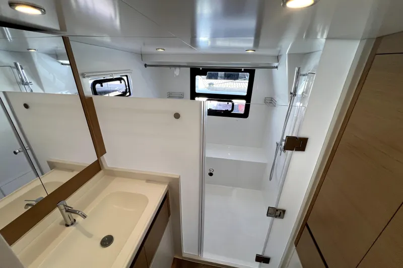 Polpo Yacht Photos Pics Modern bathroom interior in 2025 Balance 482 yacht, featuring sleek design and ample lighting.