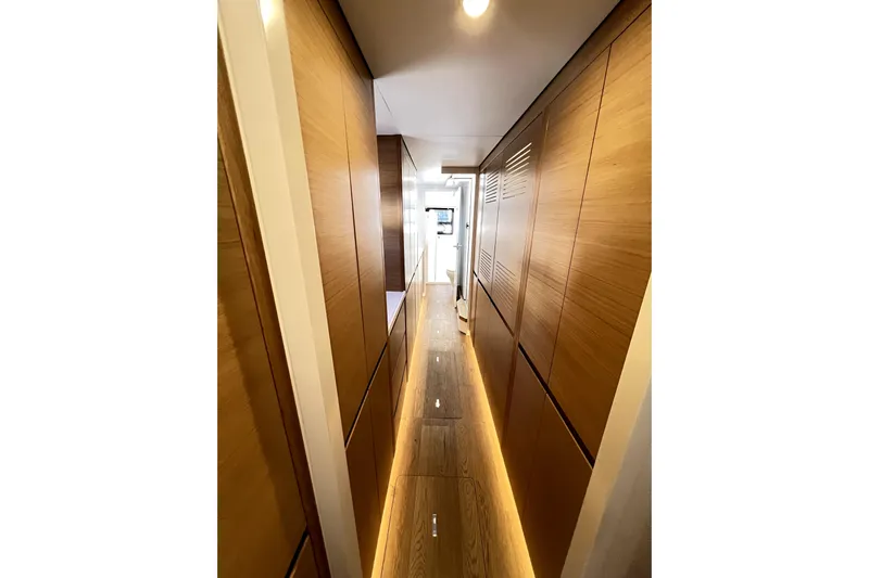 Polpo Yacht Photos Pics Modern yacht interior hallway with wooden paneling, Balance 482, 2025 model.