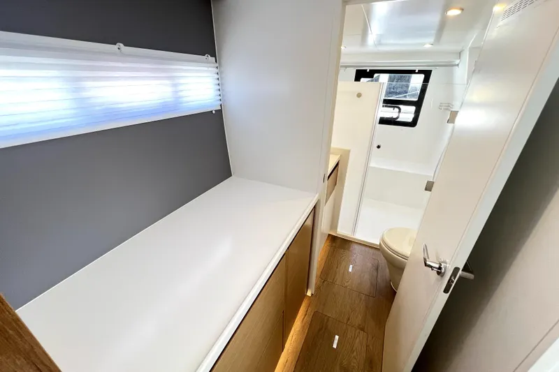 Polpo Yacht Photos Pics Modern bathroom interior in 2025 Balance 482 model, featuring sleek design and wood flooring.