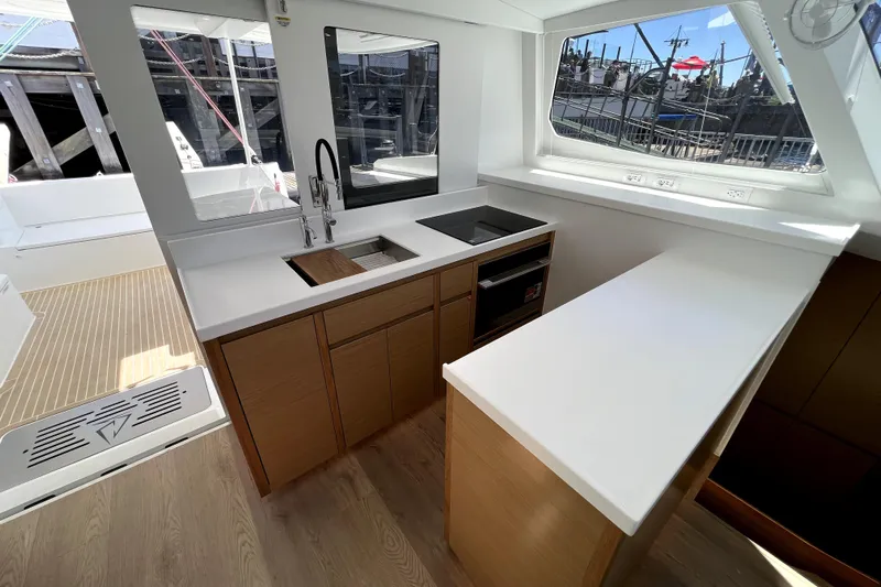 Polpo Yacht Photos Pics Modern kitchen interior on Balance 482 yacht, 2025 model, featuring sleek countertops and appliances.