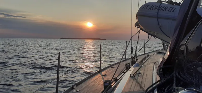 "acamar Iii" Yacht Photos Pics Sailing at sunset on a 1992 Grand Soleil 45 German Frers yacht.