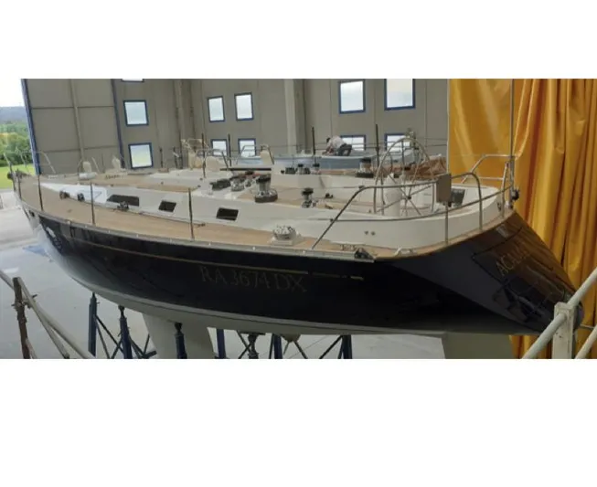 "acamar Iii" Yacht Photos Pics 1992 Grand Soleil 45 German Frers yacht in a boatyard, elevated on stands.