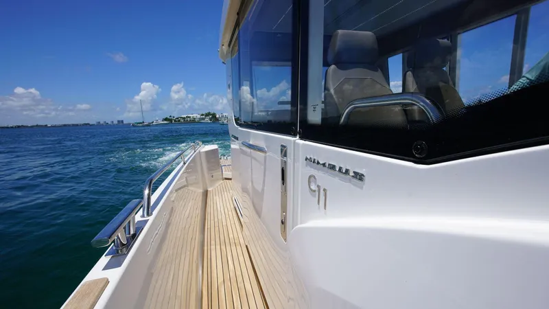 In-stock 2024 Nimbus C11 #082 Yacht Photos Pics 2024 Nimbus Commuter 11 #082 cruising on a sunny day.