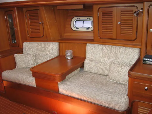Vesta Yacht Photos Pics Main saloon - stbd settee with table