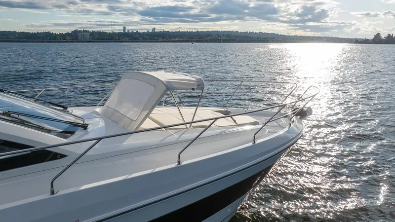 In Stock Yacht Photos Pics 2024 Beneteau Gran Turismo 45 yacht on serene water with a scenic horizon.