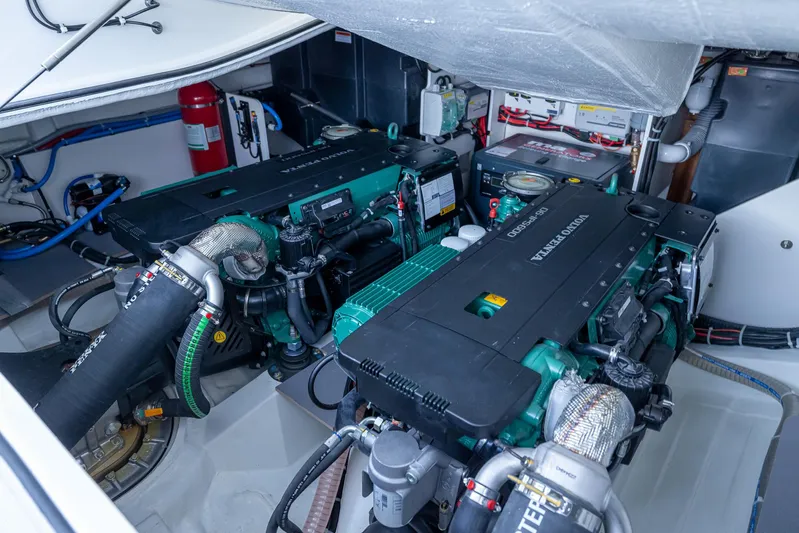 In Stock Yacht Photos Pics Engine room of 2024 Beneteau Gran Turismo 45, featuring dual Volvo Penta engines.