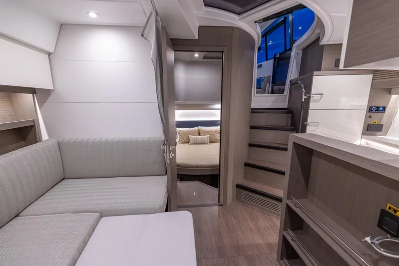 In Stock Yacht Photos Pics Luxurious interior of 2024 Beneteau Gran Turismo 45 yacht, featuring modern design and comfortable seating.