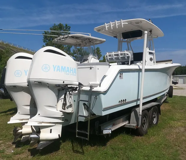  Yacht Photos Pics 2011 Sea Hunt Gamefish 29 boat with twin Yamaha engines on trailer.