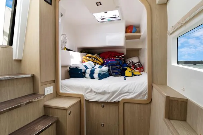 Escape Yacht Photos Pics Interior cabin of 2022 Aquila 36 Sport boat with bed and storage.