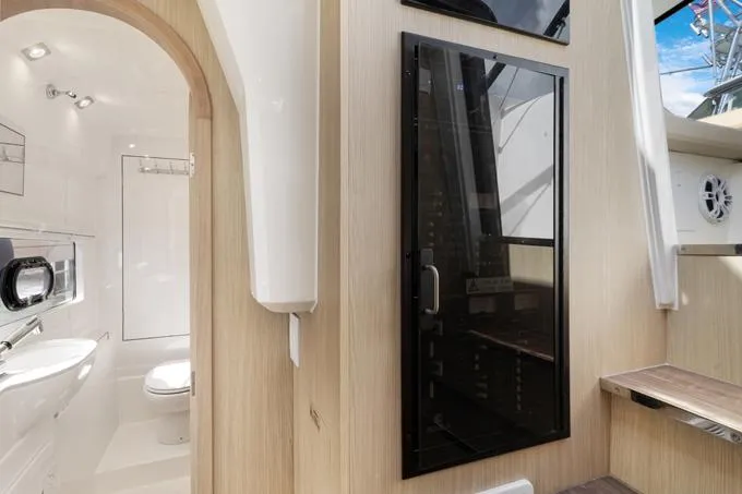 Escape Yacht Photos Pics Interior of 2022 Aquila 36 Sport yacht, featuring modern bathroom and sleek design elements.