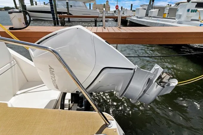 Escape Yacht Photos Pics Aquila 36 Sport 2022 boat with Mercury outboard engine at dock.