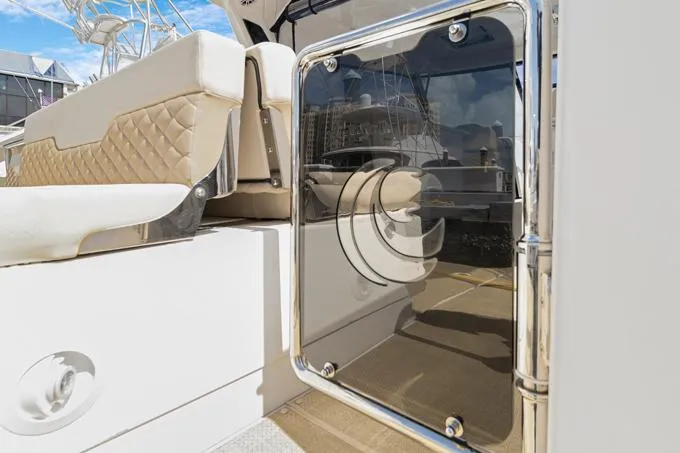 Escape Yacht Photos Pics Aquila 36 Sport 2022 boat interior with luxurious seating and sleek glass door.