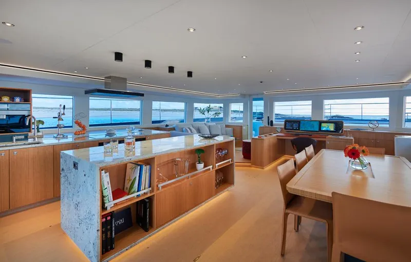 Long Island 78 Yacht Photos Pics Luxurious interior of 2026 JFA Yachts Long Island 78, featuring modern kitchen and dining area.