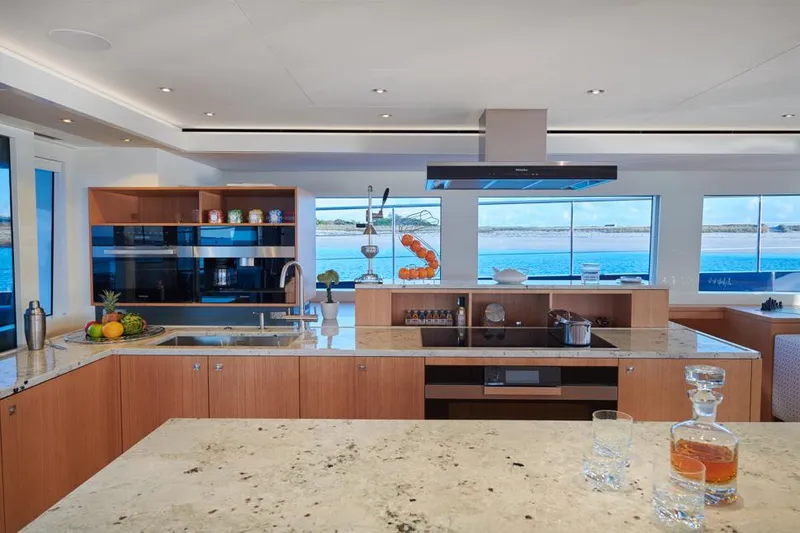 Long Island 78 Yacht Photos Pics Luxurious kitchen interior of 2026 JFA Yachts Long Island 78 with ocean view.