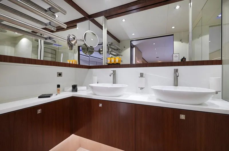 Long Island 78 Yacht Photos Pics Luxurious bathroom in 2026 JFA Yachts Long Island 78, featuring dual sinks and modern design.