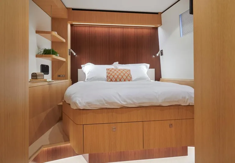 Long Island 78 Yacht Photos Pics Luxurious bedroom interior of 2026 JFA Yachts Long Island 78, featuring modern wood design.