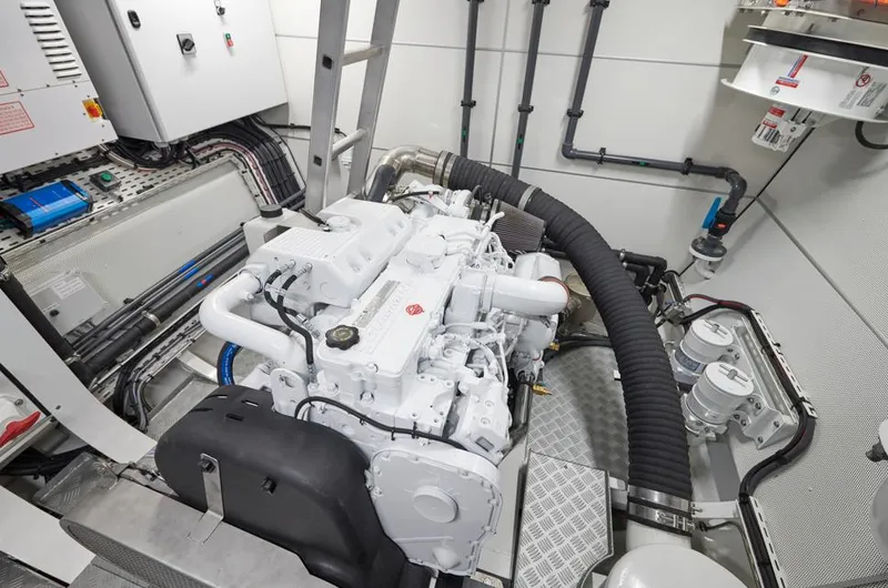 Long Island 78 Yacht Photos Pics Engine room of 2026 JFA Yachts Long Island 78, showcasing advanced machinery and piping.