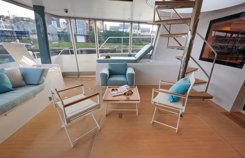 Long Island 78 Yacht Photos Pics Luxurious interior of 2026 JFA Yachts Long Island 78, featuring elegant seating and modern design.