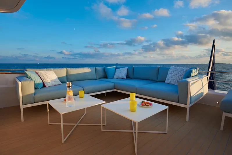 Long Island 78 Yacht Photos Pics Luxurious deck seating on 2026 JFA Yachts Long Island 78, with ocean view.