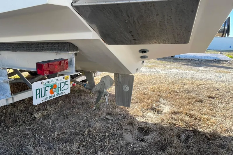 Steph-lo Yacht Photos Pics 2004 SeaVee 320i Cuddy boat on trailer with Florida license plate.