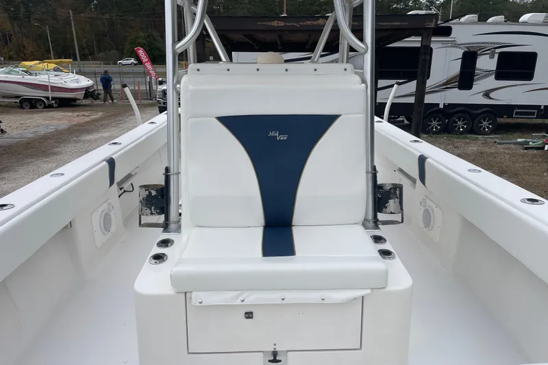 Steph-lo Yacht Photos Pics 2004 SeaVee 320i Cuddy boat interior with white and blue seating.