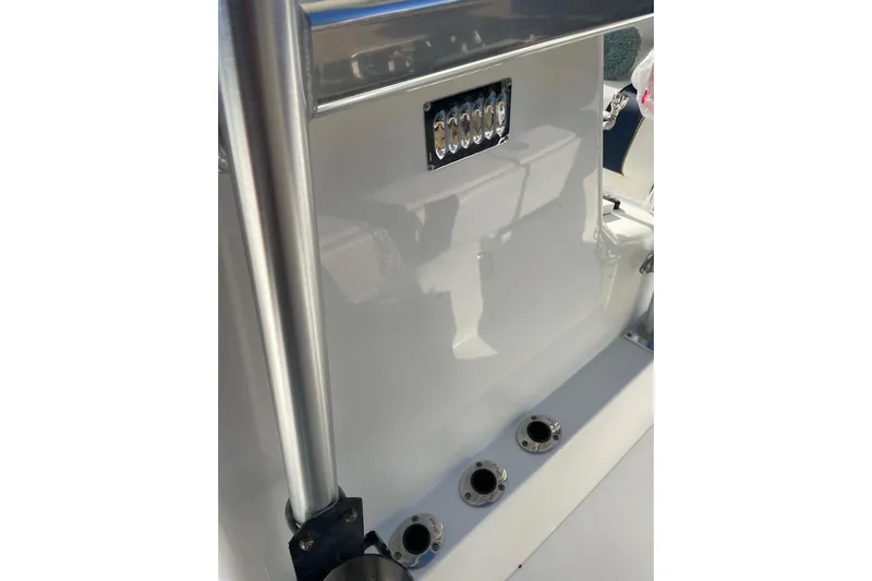 Steph-lo Yacht Photos Pics 2004 SeaVee 320i Cuddy boat interior with rod holders and sleek design.