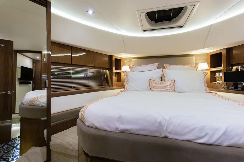 Janie Yacht Photos Pics Luxurious bedroom on a 2018 Sea Ray L650 Fly yacht.