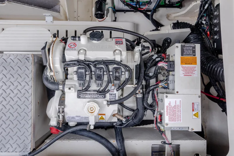  Yacht Photos Pics Engine compartment of 2020 Sea Ray Sundancer 320 Outboard with wiring and components visible.