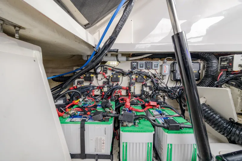  Yacht Photos Pics Engine compartment of 2020 Sea Ray Sundancer 320 Outboard with batteries and wiring.