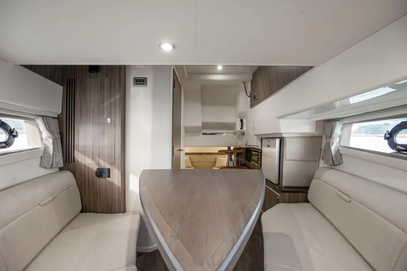  Yacht Photos Pics Interior of 2020 Sea Ray Sundancer 320 Outboard, featuring elegant seating and modern design.