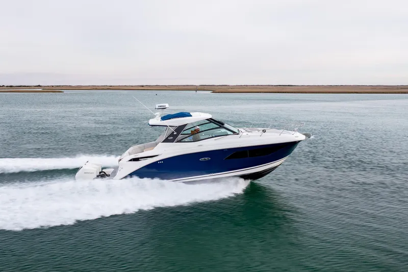  Yacht Photos Pics 2020 Sea Ray Sundancer 320 Outboard cruising on open water.