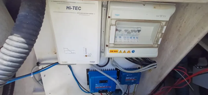  Yacht Photos Pics Electrical panel and battery charger on 2008 Fountaine Pajot Orana 44 Grand Large yacht.