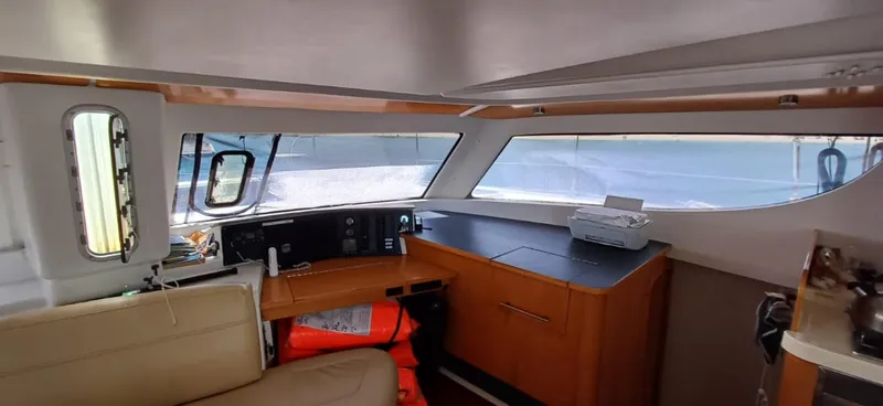  Yacht Photos Pics Interior of 2008 Fountaine Pajot Orana 44 Grand Large catamaran, featuring navigation area and windows.