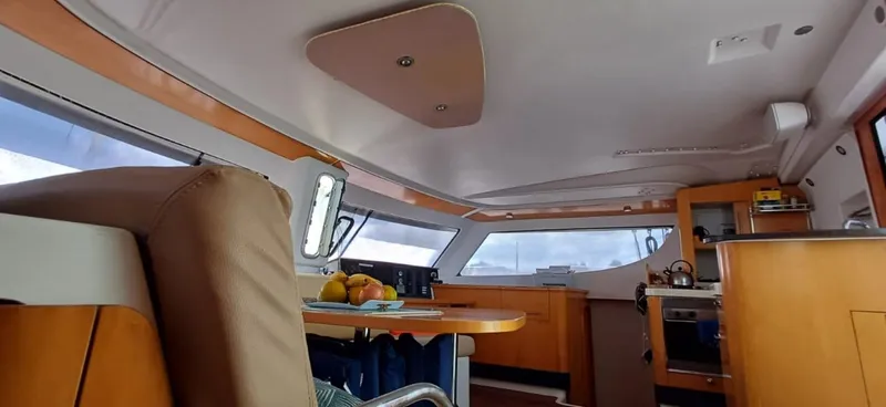  Yacht Photos Pics Interior of 2008 Fountaine Pajot Orana 44 Grand Large catamaran, featuring modern kitchen and dining area.