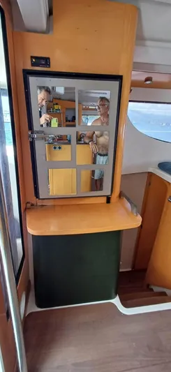  Yacht Photos Pics Interior of 2008 Fountaine Pajot Orana 44 Grand Large catamaran with mirrored cabinet.