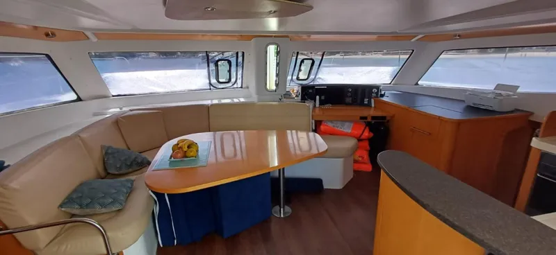  Yacht Photos Pics Interior of 2008 Fountaine Pajot Orana 44 Grand Large catamaran with seating and dining area.