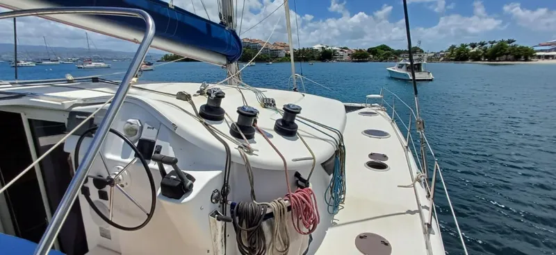  Yacht Photos Pics 2008 Fountaine Pajot Orana 44 Grand Large catamaran docked in a scenic marina.