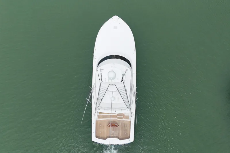 Wildcatter Yacht Photos Pics Aerial view of 2017 Viking 55 Convertible yacht on calm water.