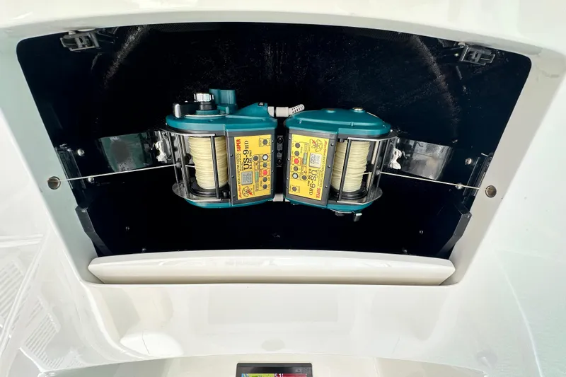 Wildcatter Yacht Photos Pics 2017 Viking 55 Convertible fishing reel compartment with dual electric reels.