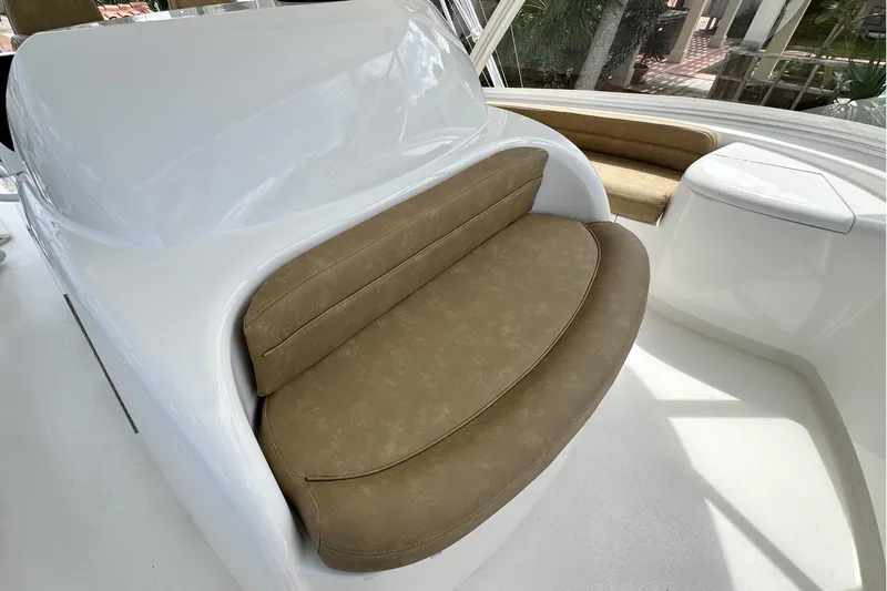 Wildcatter Yacht Photos Pics Luxurious seating on 2017 Viking 55 Convertible yacht, featuring elegant brown upholstery.