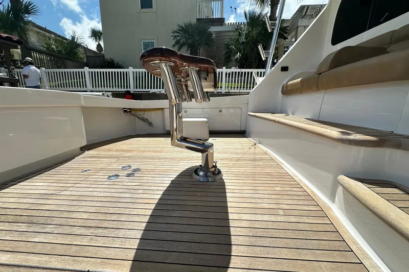 Wildcatter Yacht Photos Pics 2017 Viking 55 Convertible yacht deck with polished wood and seating.