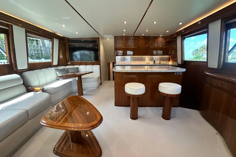 Wildcatter Yacht Photos Pics Luxurious interior of 2017 Viking 55 Convertible yacht with elegant seating and modern kitchen.