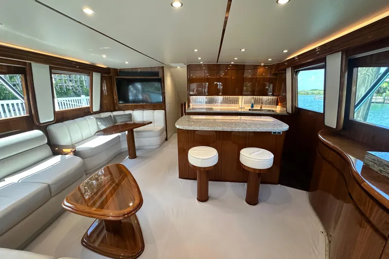 Wildcatter Yacht Photos Pics Luxurious interior of 2017 Viking 55 Convertible yacht with elegant seating and modern kitchen.