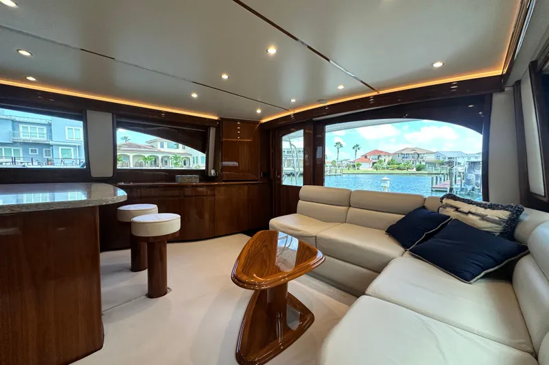 Wildcatter Yacht Photos Pics Luxurious interior of 2017 Viking 55 Convertible yacht with elegant seating and waterfront view.