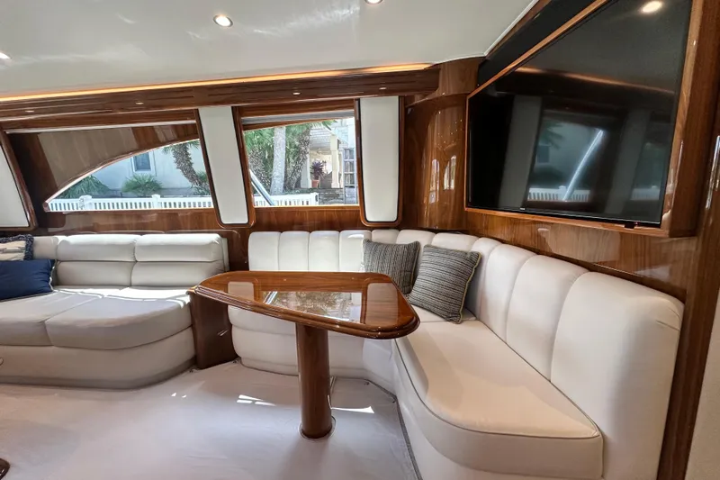 Wildcatter Yacht Photos Pics Luxurious interior of 2017 Viking 55 Convertible yacht with plush seating and elegant wood finishes.