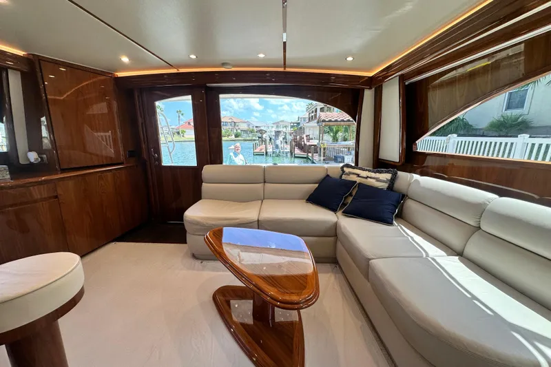 Wildcatter Yacht Photos Pics Luxurious interior of 2017 Viking 55 Convertible yacht with elegant seating and wooden accents.