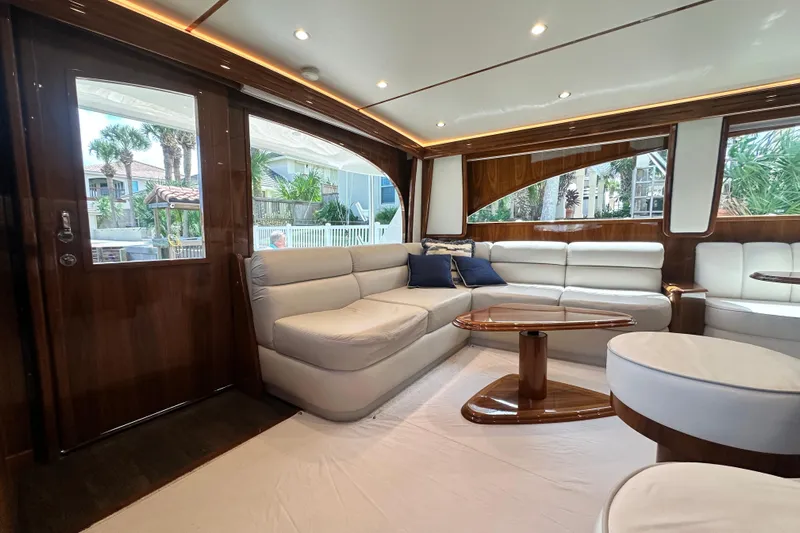 Wildcatter Yacht Photos Pics Luxurious interior of 2017 Viking 55 Convertible yacht with elegant seating and wooden accents.