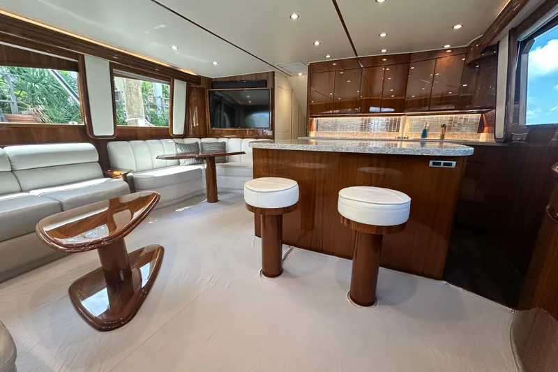 Wildcatter Yacht Photos Pics Luxurious interior of 2017 Viking 55 Convertible yacht with elegant seating and modern design.